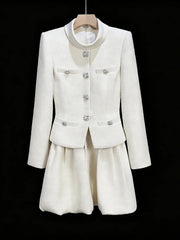 White suit with decorative buttons on a black background