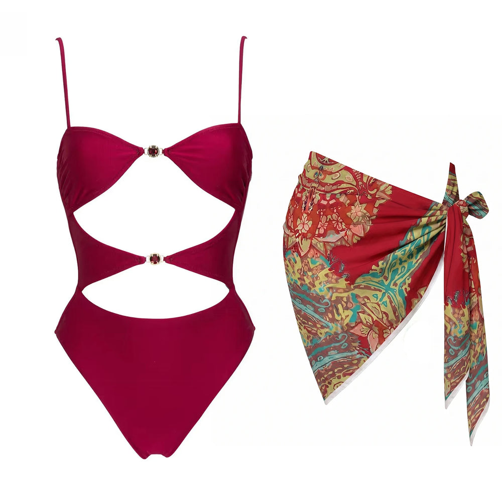 Flat lay of cutout detail embellished one-piece and patterned sarong