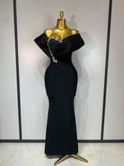 Black one shoulder embellished neckline gown