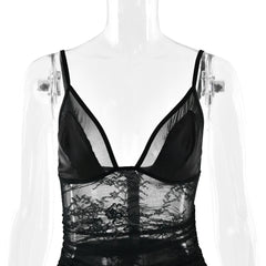 Black lace lingerie on a mannequin against a white background