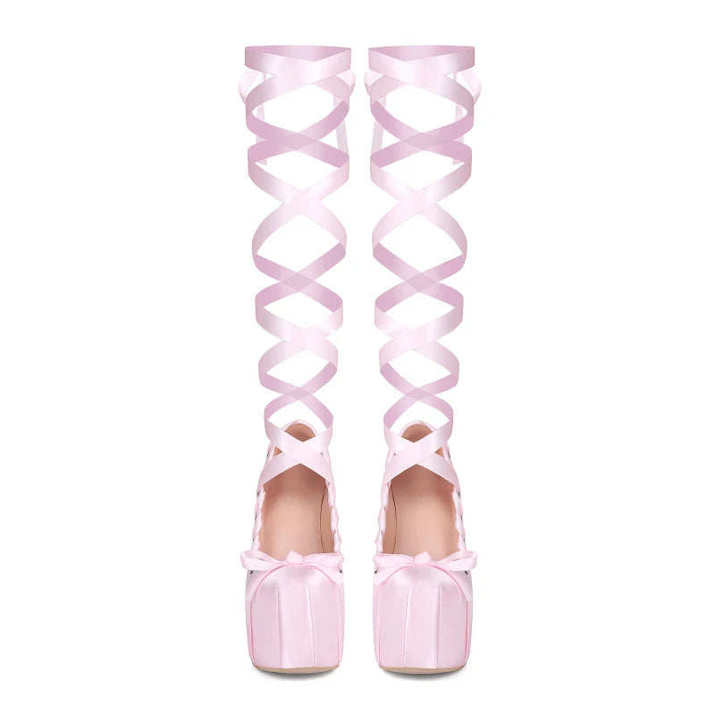 Pink high-heeled shoes with bow details and matching over-the-knee ribbons on a white background