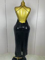Black jumpsuit on a mannequin against a white background
