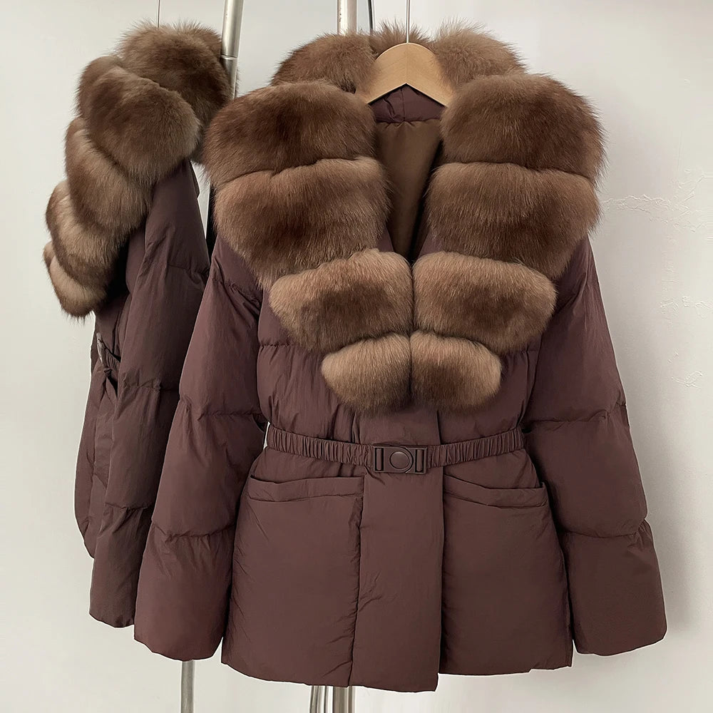 Brown puffer jacket with fur trim on a hanger against a white background