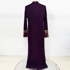 Back view of purple maxi dress with beaded neckline and flare sleeves
