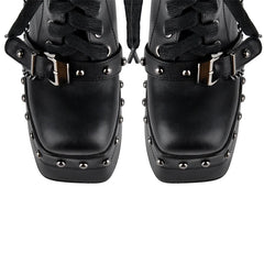 Front view of platform chunky heel ankle boots with studs