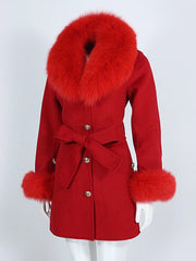 Red coat with fur collar and cuffs on a white background