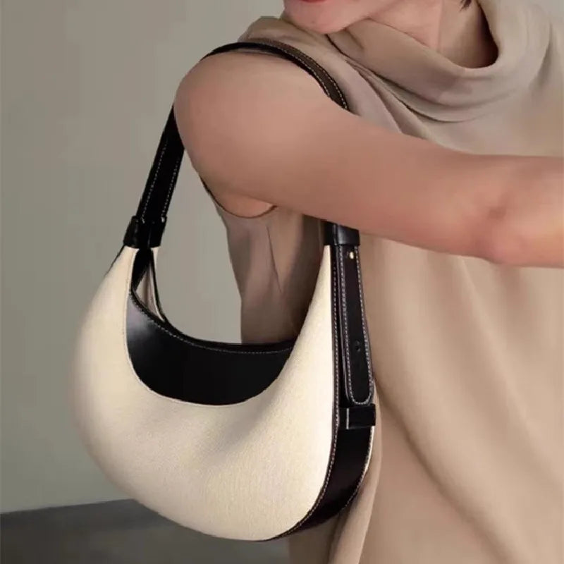 two-tone crescent shoulder bag with black leather trim