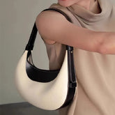 two-tone crescent shoulder bag with black leather trim