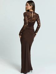 Woman wearing a brown lace top and skirt set on a light gray background