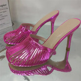 Pink metallic stiletto mule heel with open toe and caged design