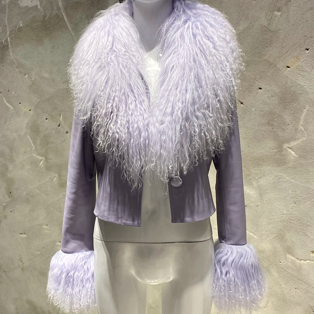 Mannequin wearing a light purple jacket with white fur trim against a textured beige background