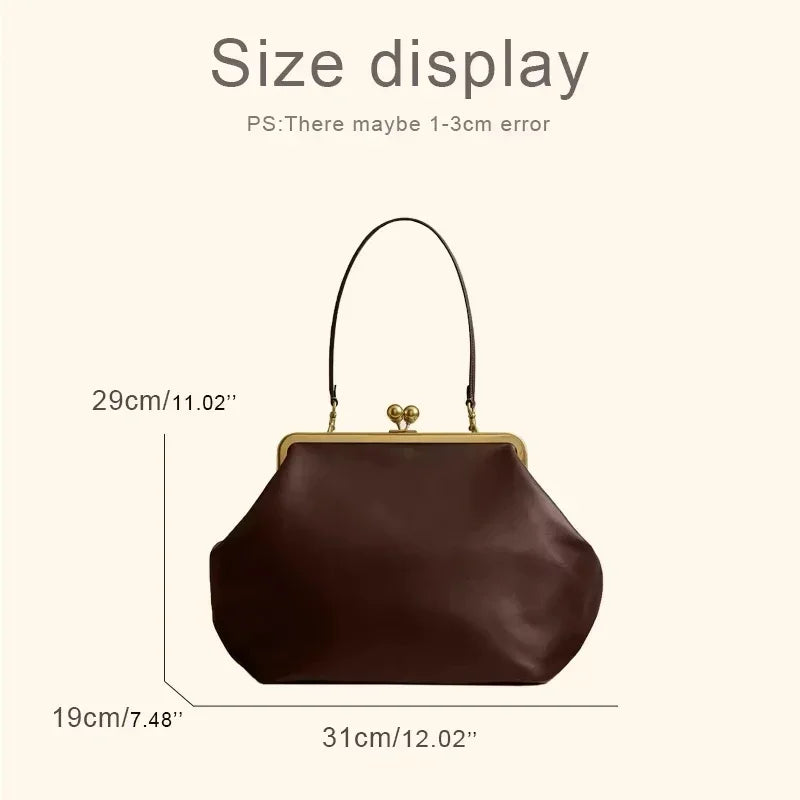 Brown handbag with size measurement labels on a beige background