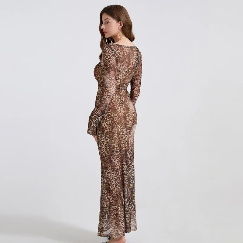 Woman wearing a long, sheer dress with a leopard print pattern