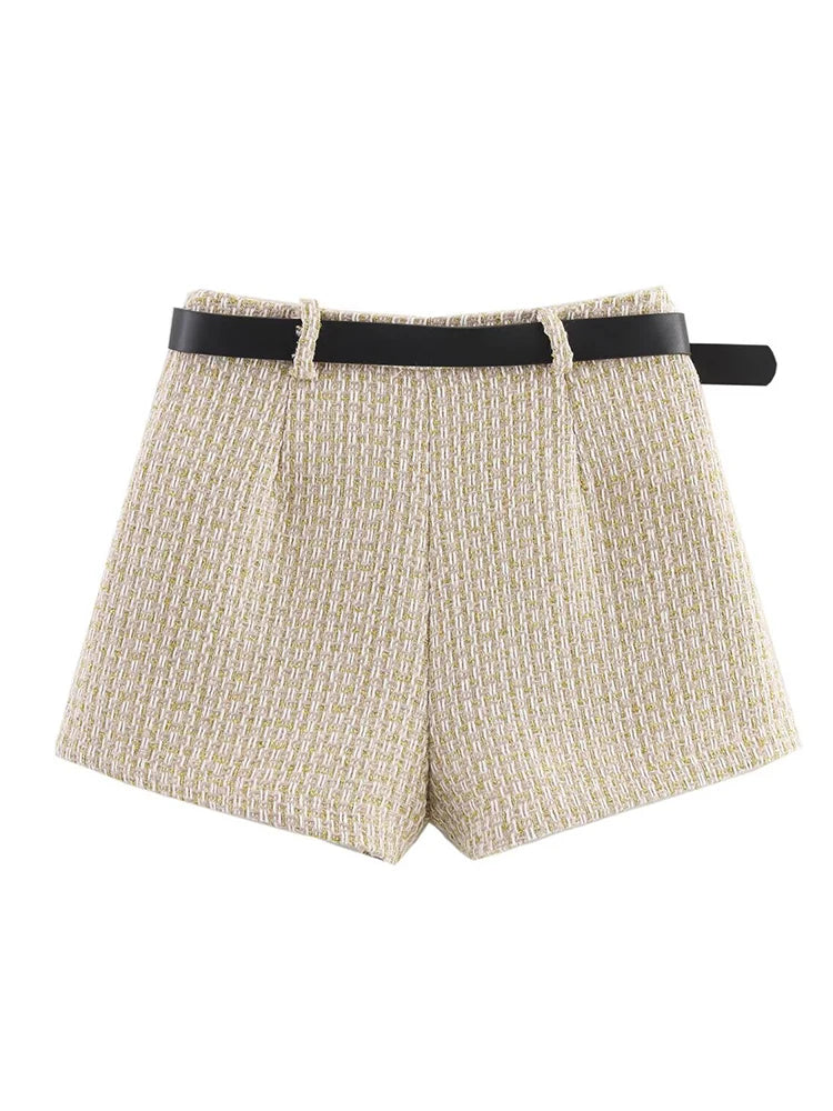 Beige shorts with a black belt on a white background