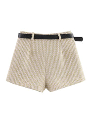 Beige shorts with a black belt on a white background