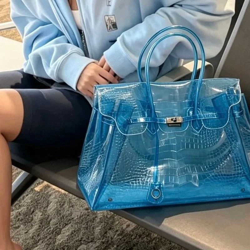 Blue crocodile embossed jelly bag with model