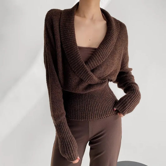 Brown knit wrap top with ribbed waist and long sleeves