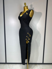 Black jumpsuit with gold accents on a mannequin against a white background