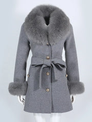 Gray coat with fur collar and cuffs on a white background