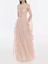 Pink evening gown with ruffled details