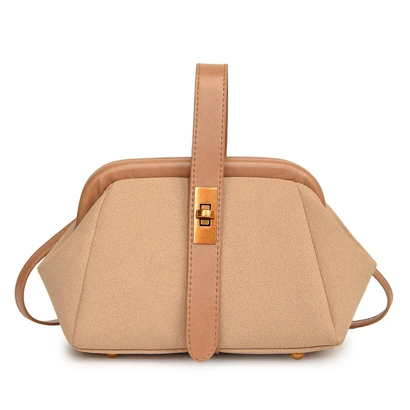 Beige handbag with brown accents on a white background