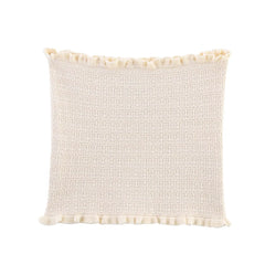 Textured cream pillow with pom-pom trim on a white background