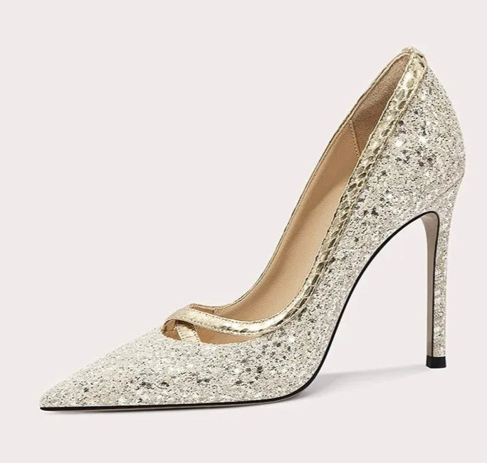 Sparkly high-heeled shoe on a white background