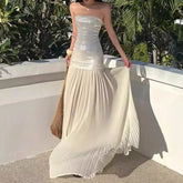 Strapless sequin bodice maxi dress with flowing pleated skirt