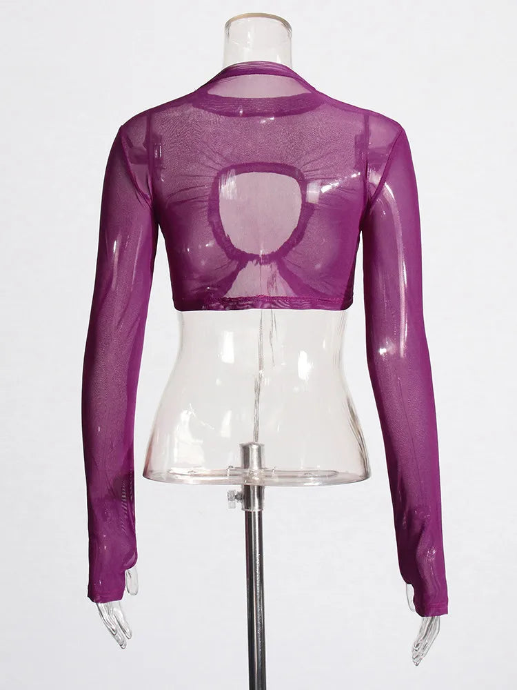 Purple sheer long-sleeve top on a mannequin against a white background