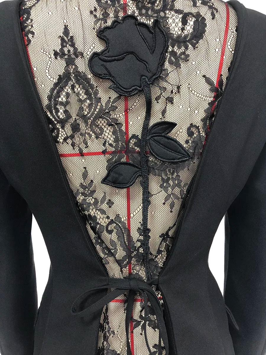 Black lace garment with floral details