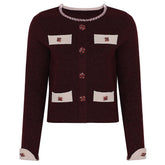 Burgundy knit cardigan with jeweled buttons and contrasting trim