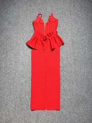 Red dress with peplum top on a gray background