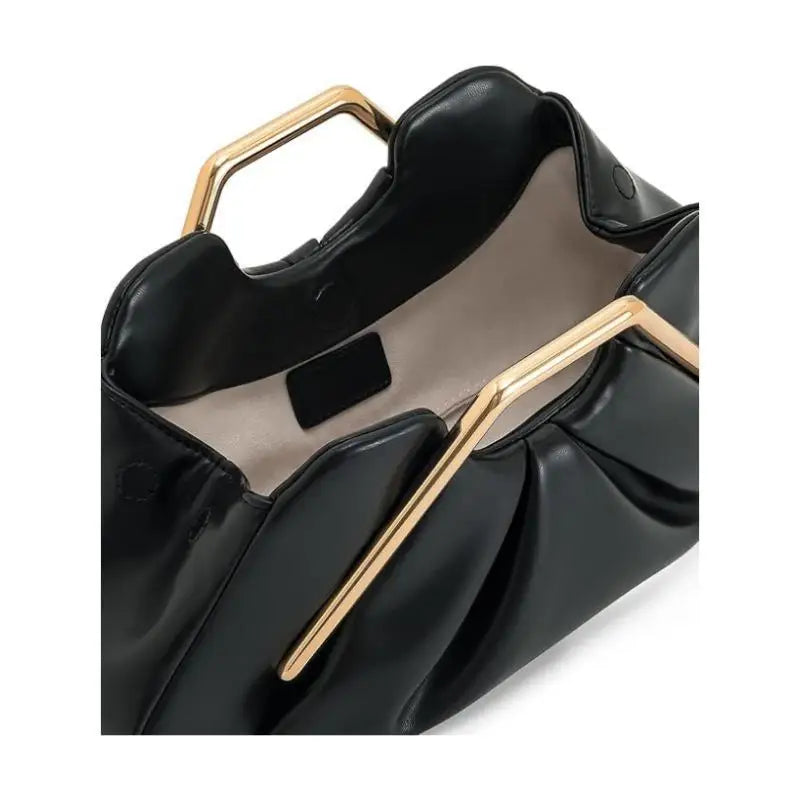 Black handbag with gold accents