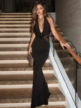 black halter evening gown with lace side panels