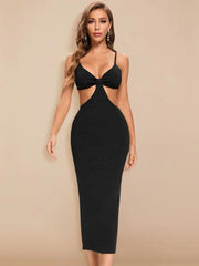 Black dress with cut-out design worn by a model on a beige background