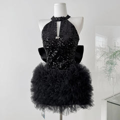 Sequin halter neck mini dress with ruffle skirt on mannequin