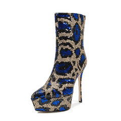 Blue and gold sequin platform high heel boot on a white background