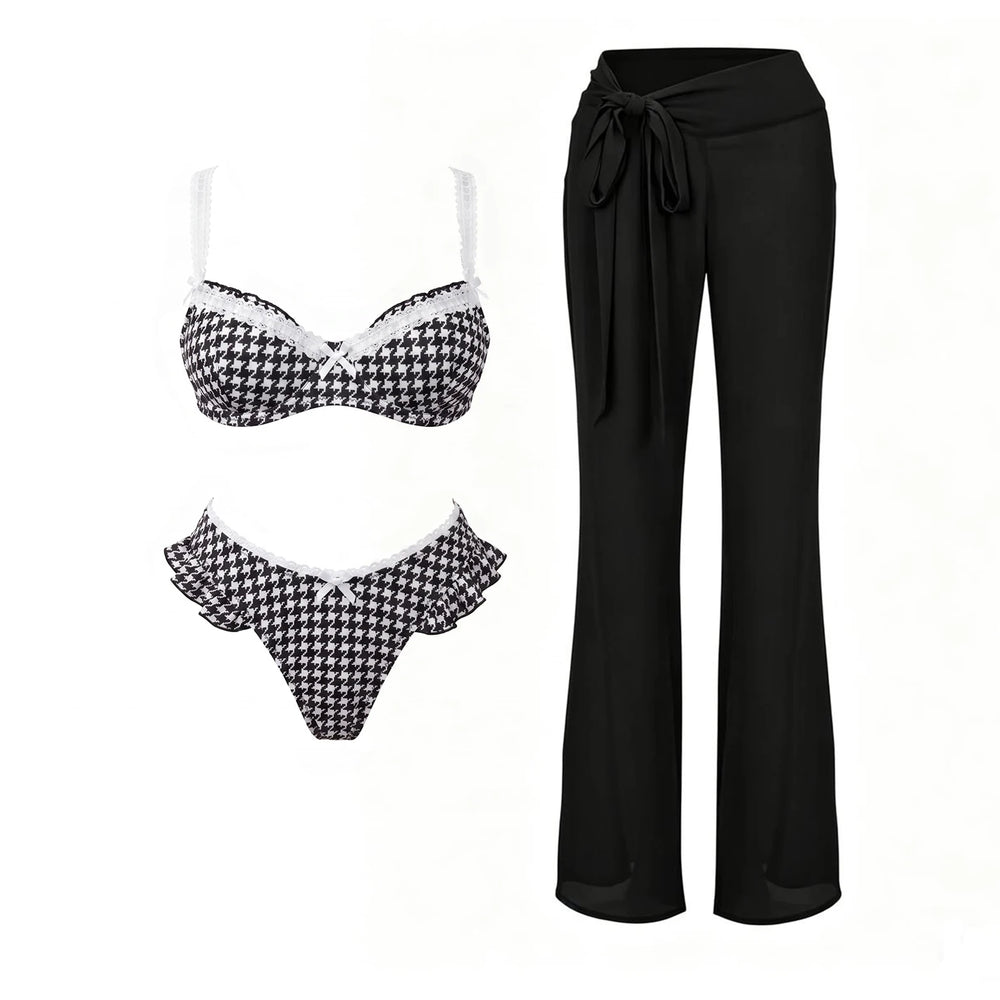 Houndstooth pattern bikini with white lace trim and black sheer beach pants