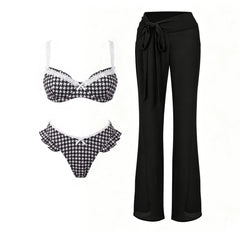Houndstooth pattern bikini with white lace trim and black sheer beach pants