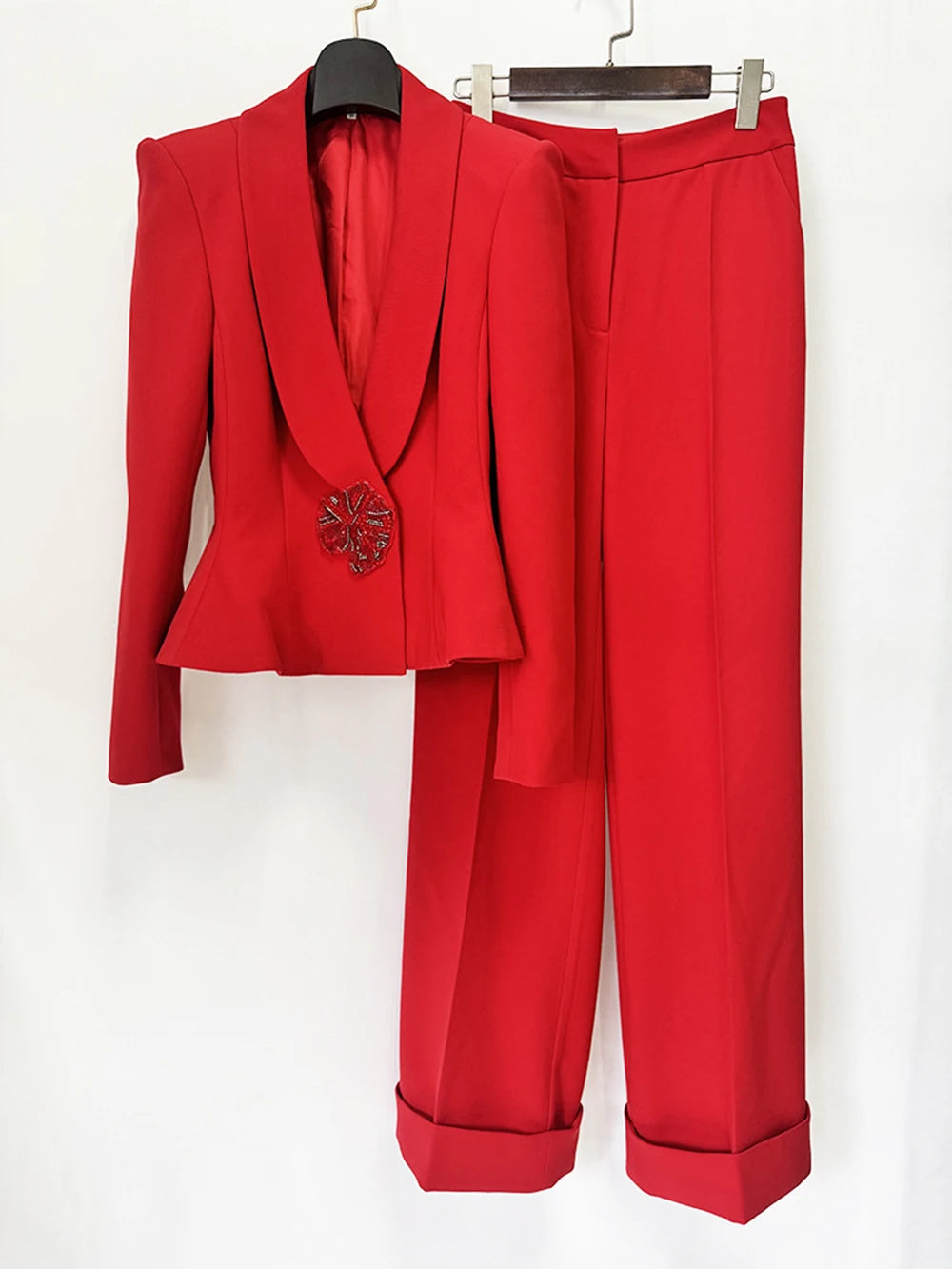 Red blazer and wide leg pant set hanging