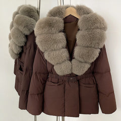Brown puffer jacket with fur collar on a mannequin against a white background