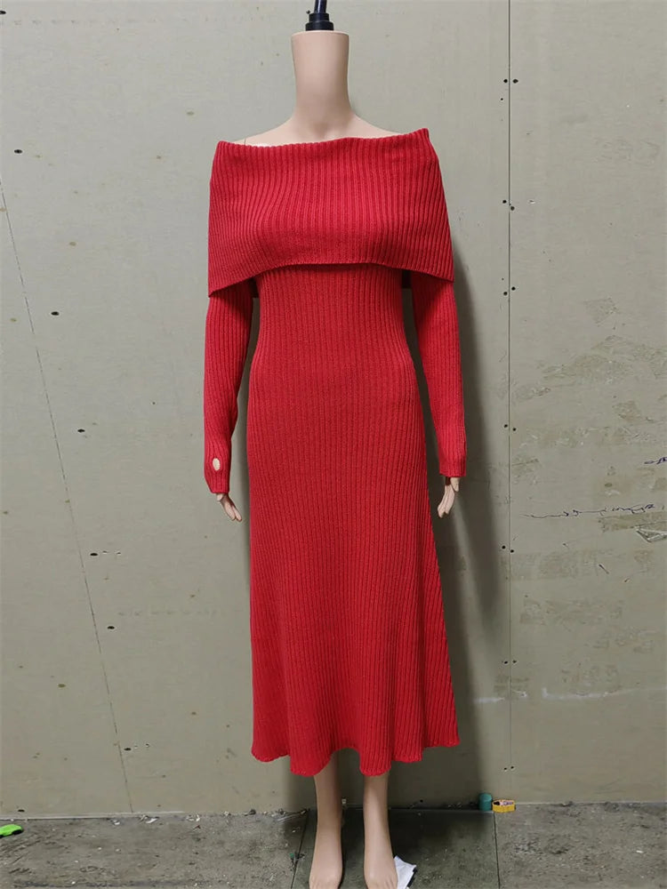 Red off-shoulder dress on a mannequin against a plain background