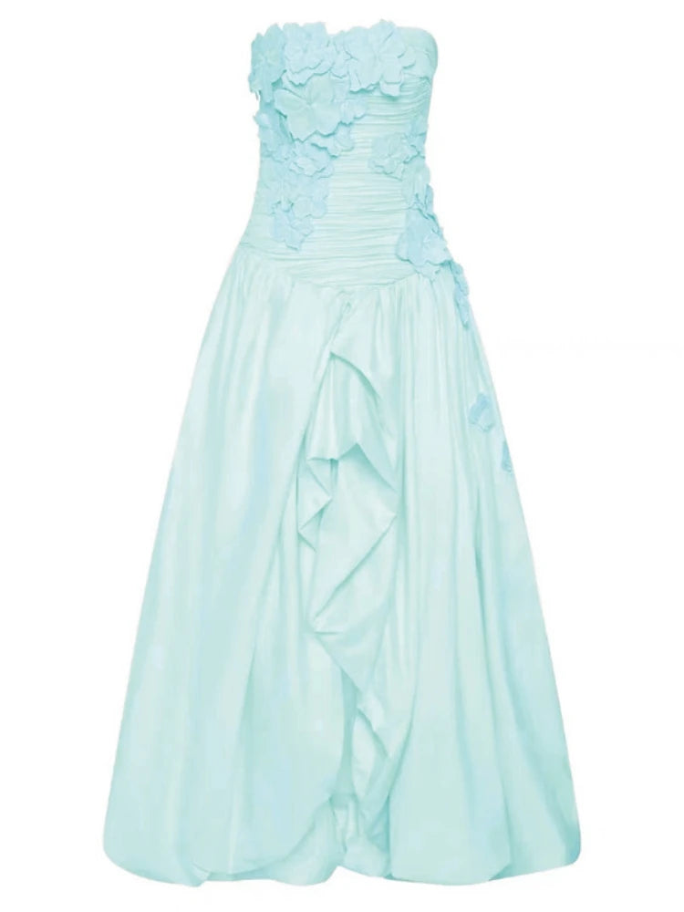 Light blue strapless gown with floral details on a white background
