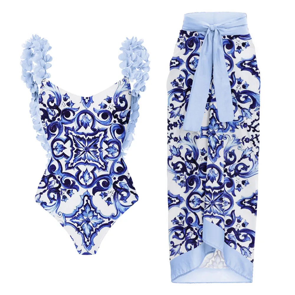 Ruffled floral print one-piece swimsuit and flowing maxi skirt set
