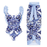 Ruffled floral print one-piece swimsuit and flowing maxi skirt set