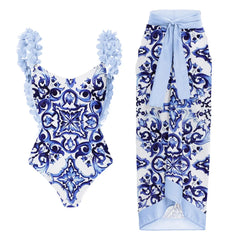 Ruffled floral print one-piece swimsuit and flowing maxi skirt set