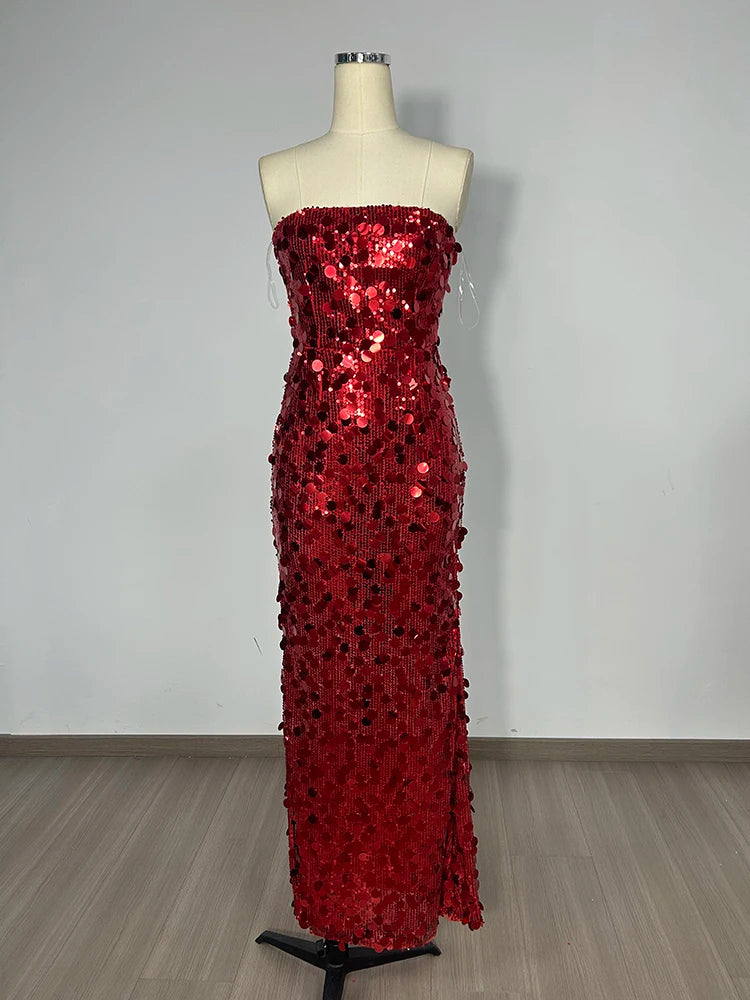 Red sequin strapless gown on a mannequin against a plain background