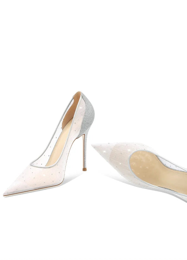 White high-heeled shoes on a white background