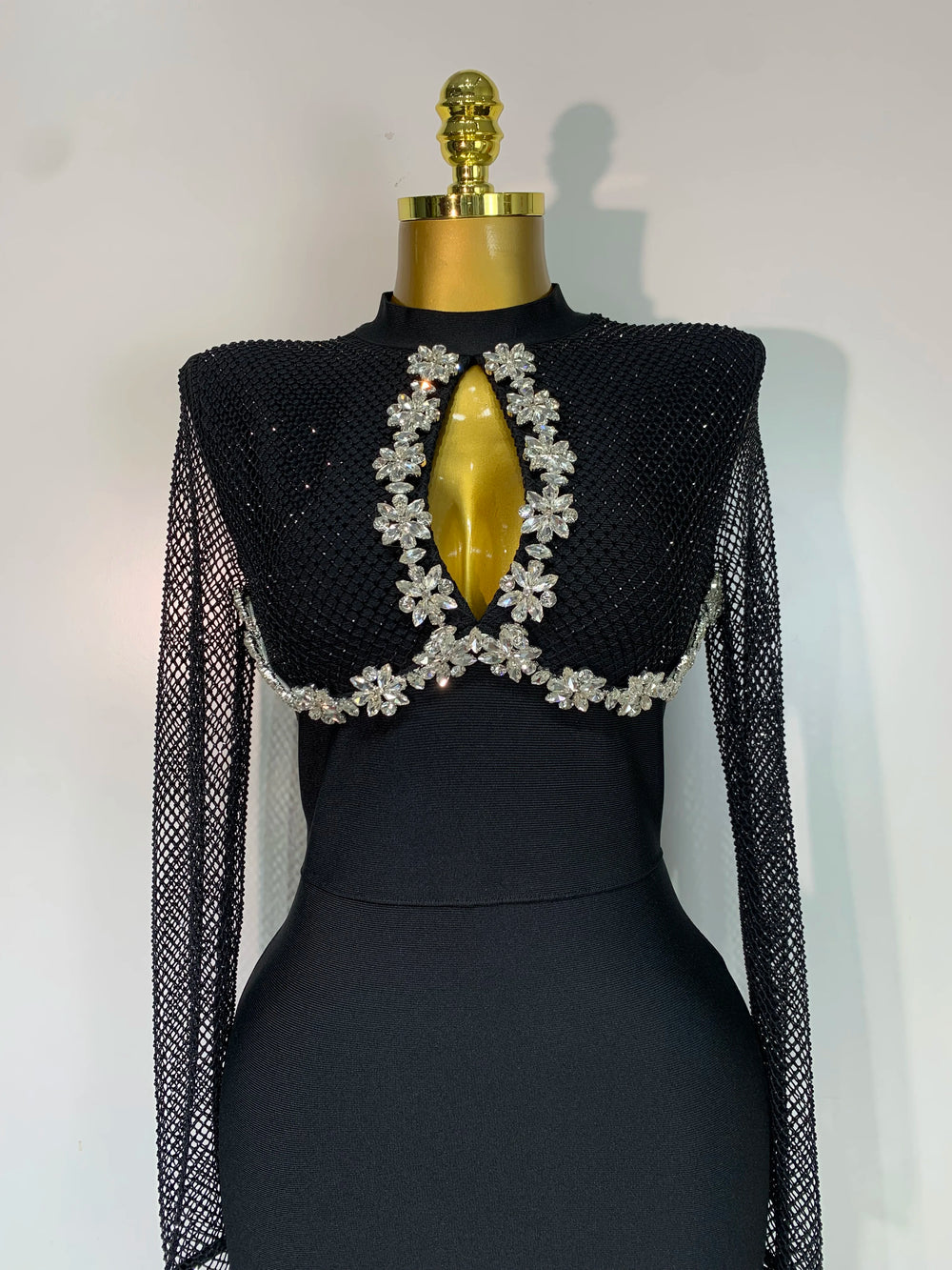 Close-up of beaded neckline on maxi dress
