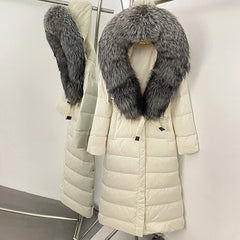 White puffer coat with gray fur collar on a rack against a white background